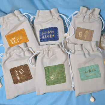 束口藏書袋 - 燙金麂皮布片